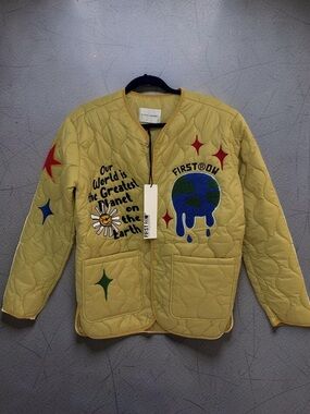 First Row Yellow Quilted Puffer Jacket with Earth Graphic